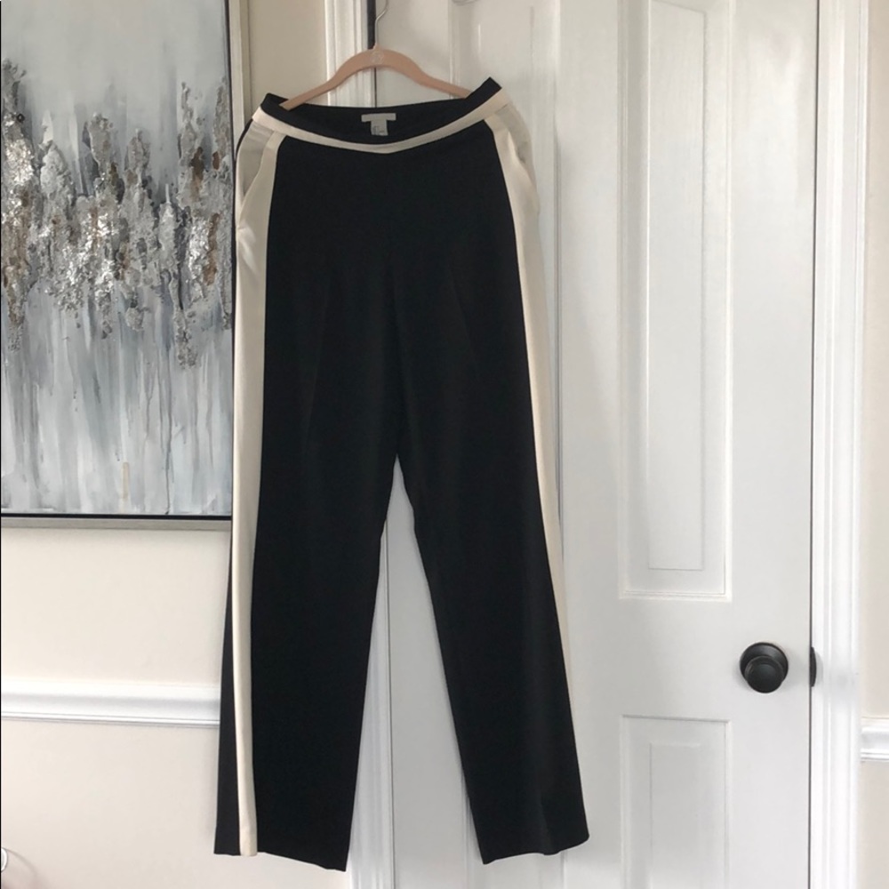 Black pants with white lines on the side!